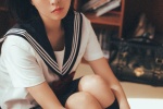 穿着黑丝袜的制服美女写真照片