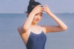 泳衣美女海边灵动诱人写真照图片