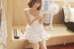 Seductive photo of charming and sexy beauty with fair skin and beautiful legs
