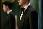 Wang Yibo's elegant and handsome photo in white shirt and black suit