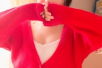 Photo of sexy pretty girl in red cardigan and low-cut suspender belt