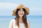 Summer seaside straw hat beauty mobile wallpaper