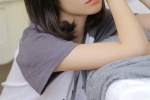 Sexy and charming photo of beautiful girl with beautiful legs on bed