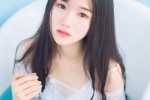Temperamental long-haired beauty wet and seductive photo in bathtub