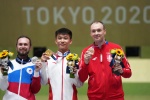 Zhang Changhong shoots men's 50m rifle three-position gold medal