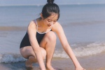 泳衣美女海边灵动诱人写真照图片