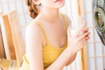 Sexy beauty model with suspender ponytail and eye-catching photo