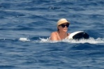 Charlize Theron new photos from sea vacation