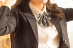 Seductive photo of beautiful school girl at desk in JK uniform