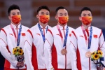 Very clear and beautiful pictures of the Russian men's gymnastics team awarding awards
