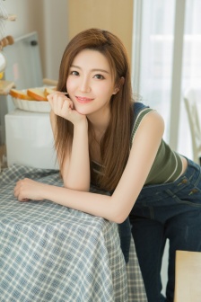 Sexy and charming beauty wearing sling in private room seductive photo