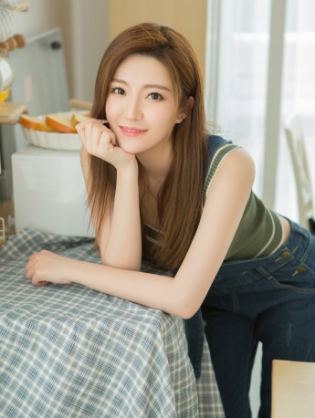 Sexy and charming beauty wearing sling in private room seductive photo