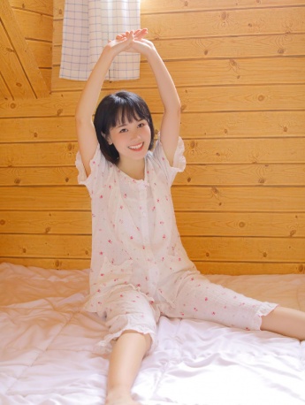Short-haired beauty in pajamas, white and tender, sexy private room photo