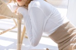 First love girl's cool summer photo with long legs in suspenders