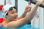 Chinese Canadian swimmer wins 100m butterfly