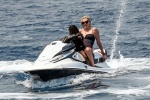 Charlize Theron new photos from sea vacation