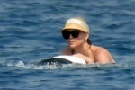 Charlize Theron new photos from sea vacation