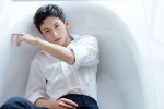 Zhang Zhehan handsome photo picture with relief flowers in white shirt