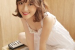 Seductive photo of charming and sexy beauty with fair skin and beautiful legs