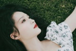 Li Qin's charming and sexy photo in early summer floral dress