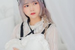Eye-catching cos beauty maid dress up beautiful photo