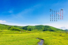 March 2022 green grassland scenery desktop calendar wallpaper
