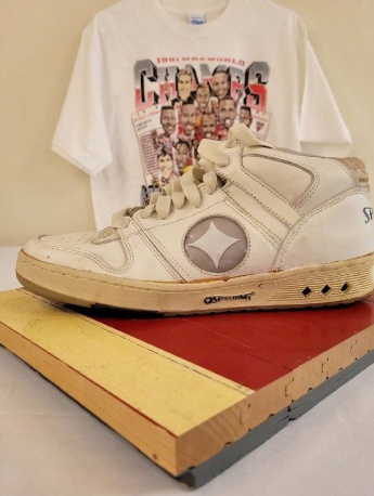 Spalding white sneakers displayed from multiple angles