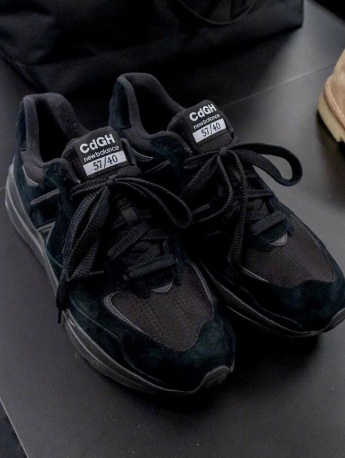 NB co-branded CdGH pure black color display from multiple angles